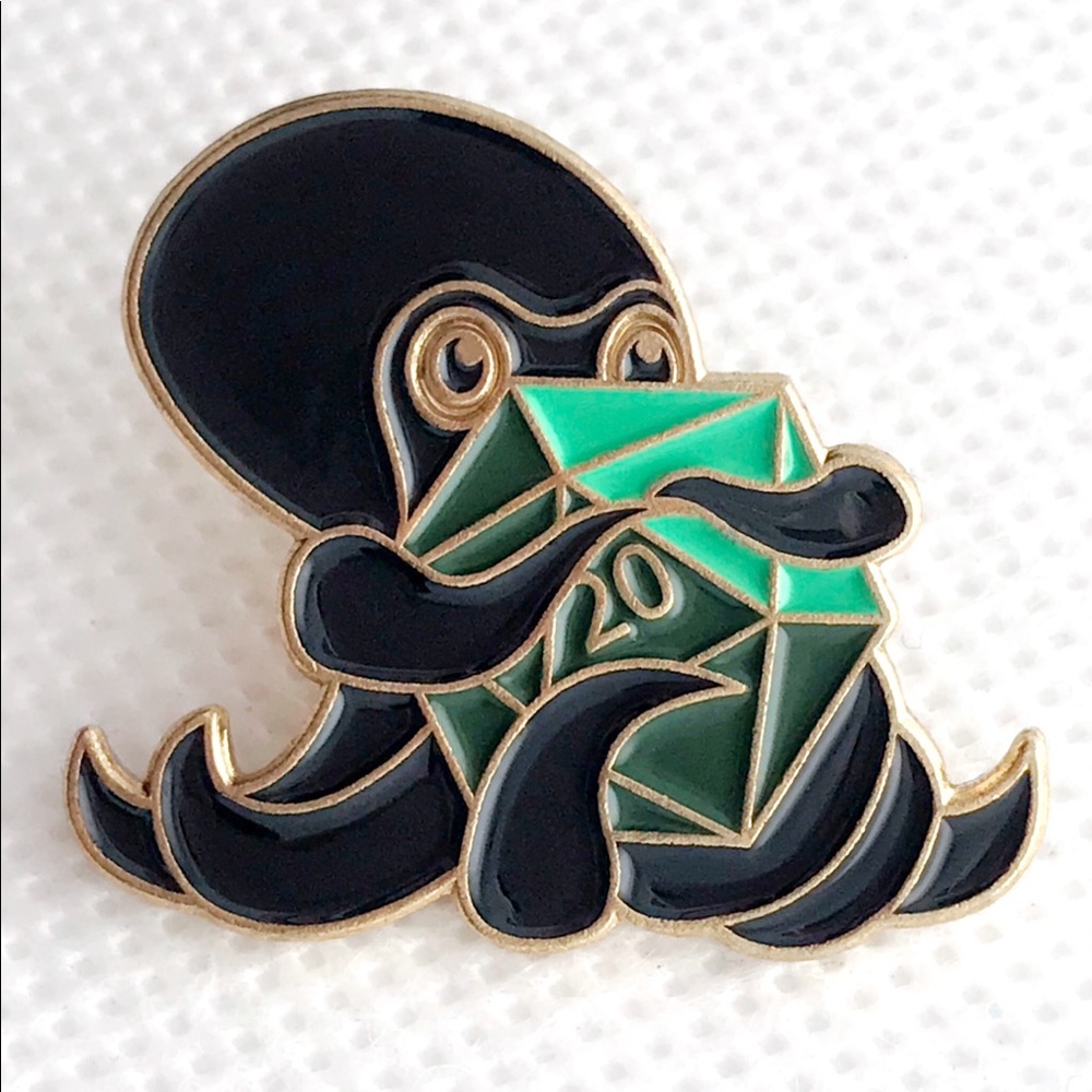 gold and green d20 pin